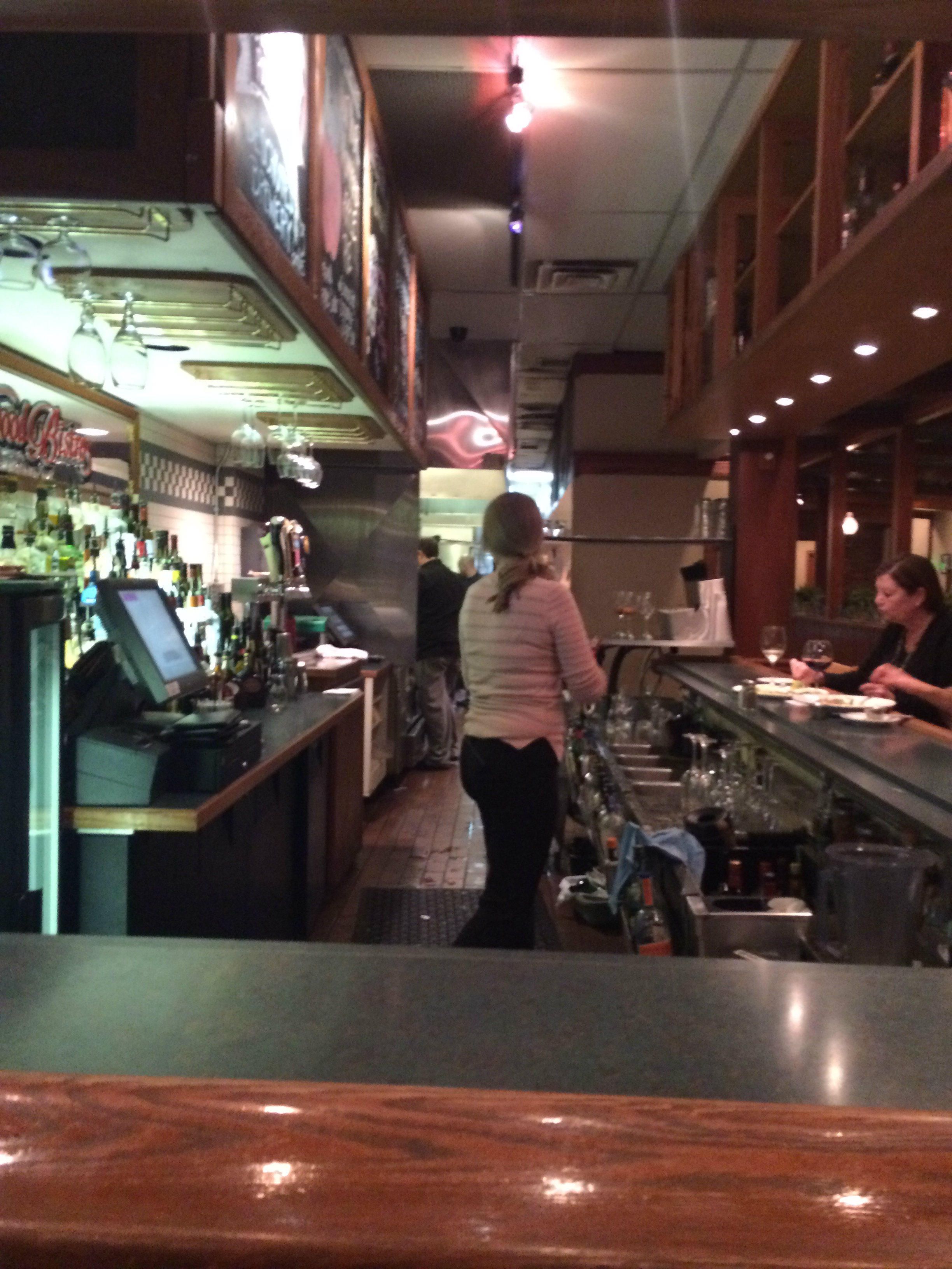 A lady working at the bar