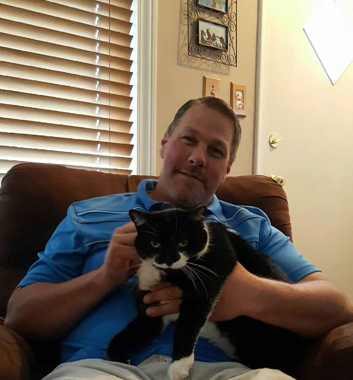 Image: My dad with my cat