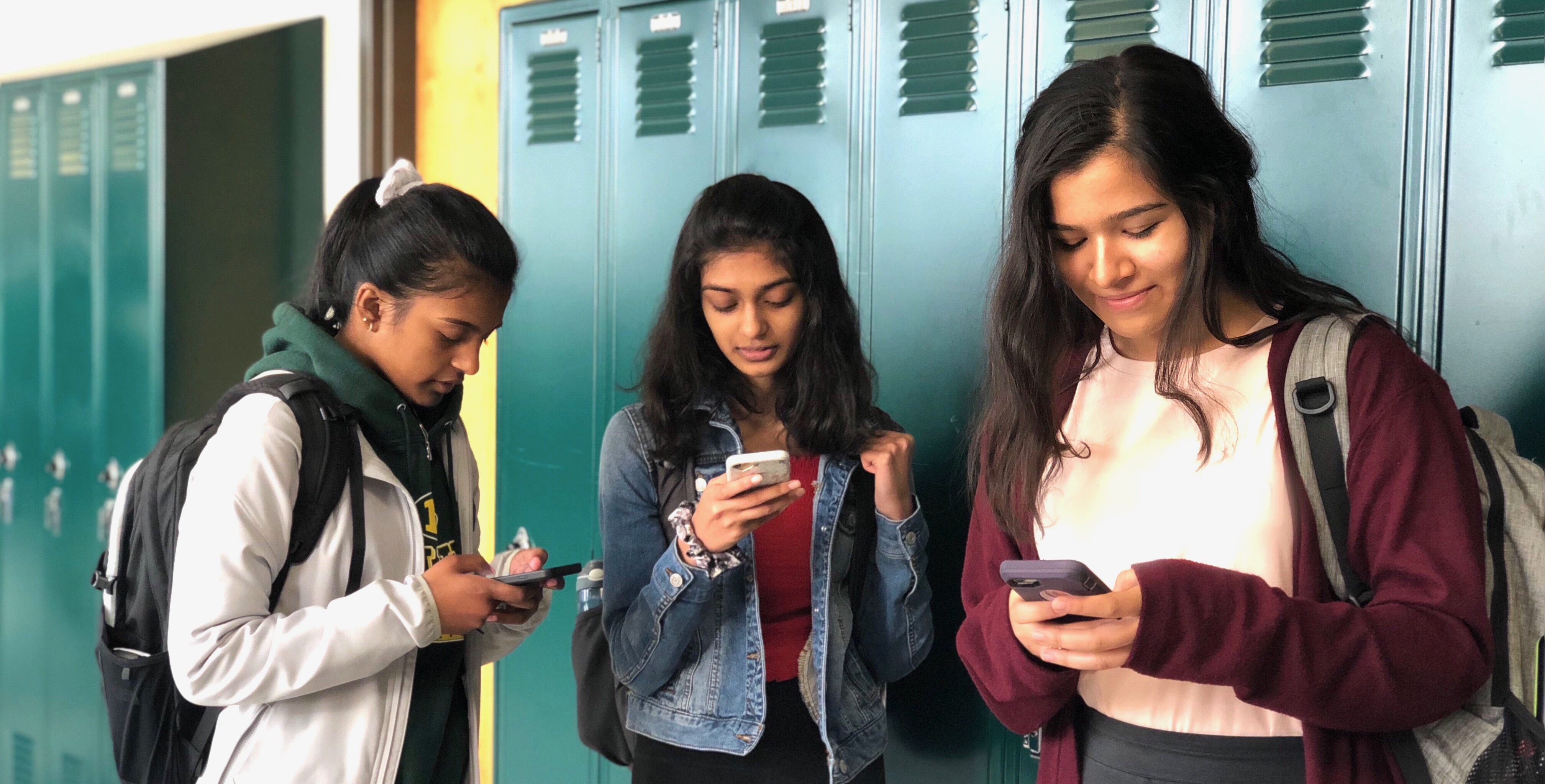 Teens on their phones