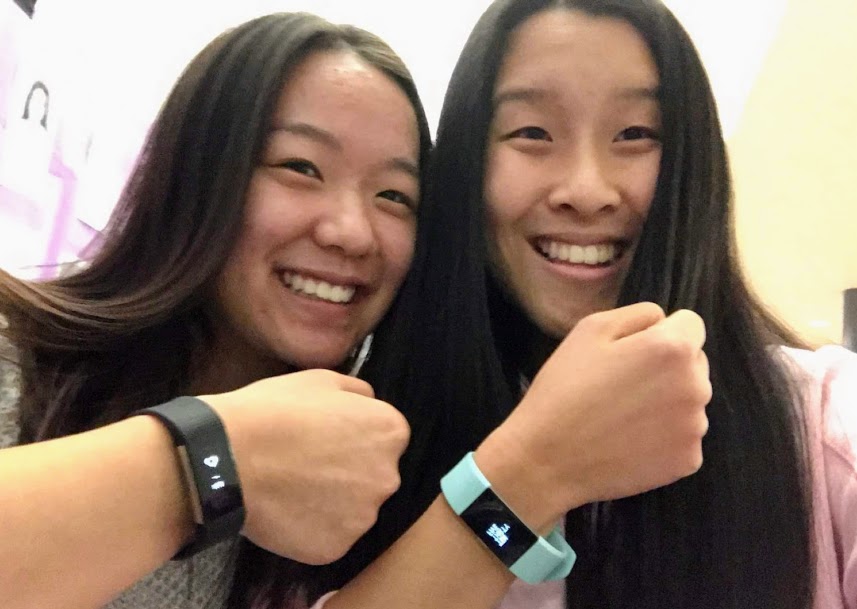 Abby and Lily with their Fitbits