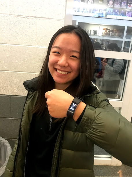 Lily with her Fitbit Charge 2