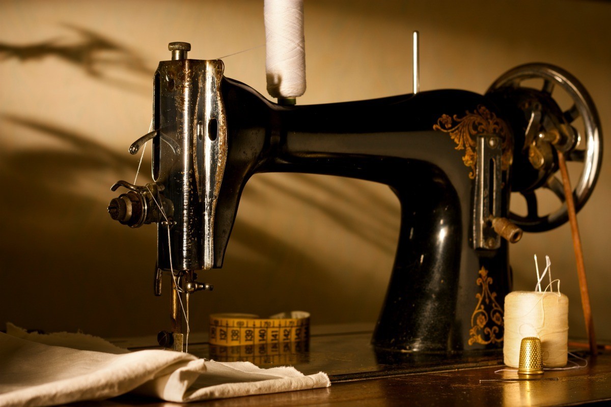 small black old fashion sewing machine