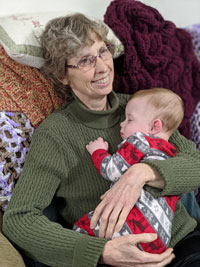 Beth Mattison holding her grandson